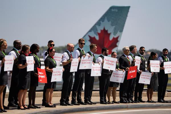 Canadians Stranded as Air Canada Strike Grounds Flights, Government Criticized for Lack of Action
