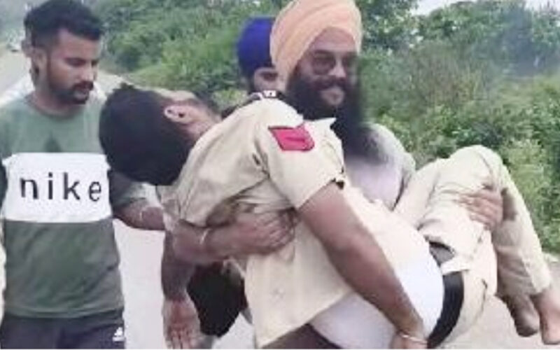 Police Officer Collapses During Flood Relief Operation Near Lalru, Saved by Villagers