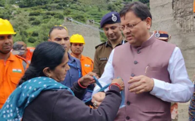 Uttarakhand CM Overwhelmed as Rescued Woman Pilgrim Ties Rakhi Made from Saree’s Pallu