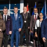 Mayor Shannon Dean and Council Re-Elected, Sworn In to Serve New Term Chestermere (Rajeev Sharma) : In a momentous occasion for the residents of Chestermere, Mayor Shannon Dean and members of the Town Council were officially sworn in this morning, marking the beginning of a new term dedicated to leadership, collaboration, and community development. The re-elected Council members include: • Murray Grant • Dr. Ritesh Narayan • Kiran Randhawa • Janelle Sandboe • Robert Schindler • Rob Wawrzynowski The swearing-in ceremony drew residents, community leaders, and dignitaries who gathered to celebrate the reaffirmation of local governance and commitment to public service. In his remarks, Mayor Shannon Dean expressed heartfelt gratitude to the community for its continued trust and support. “It’s an honor to continue serving the people of Chestermere,” Mayor Dean said. “Together, we will build on our successes, strengthen local services, and ensure our city remains a vibrant, inclusive, and forward-looking community for all.” Town officials extended thanks to everyone who attended the event, noting that the renewed leadership team is eager to continue serving with dedication, transparency, and integrity throughout the new term. The ceremony marks a fresh chapter for Chestermere, highlighting unity, civic pride, and a shared vision for the city’s future.