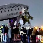 Pilots dead, several injured as Air Canada plane rams into parked truck at New York airport
