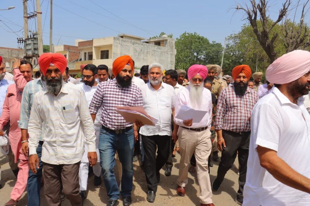 Minister Lal Chand Kataruchak reviews wheat procurement at Bhagtanwala Mandi